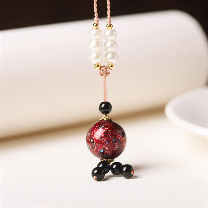 Collana con Buddha Stones, ebano, lacca Aurora, perline artigianali, perle, equilibrio