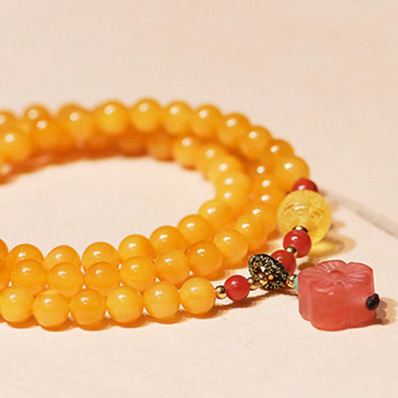 Collana con ciondolo a forma di fiore in ambra curativa e bilanciata - Image 6