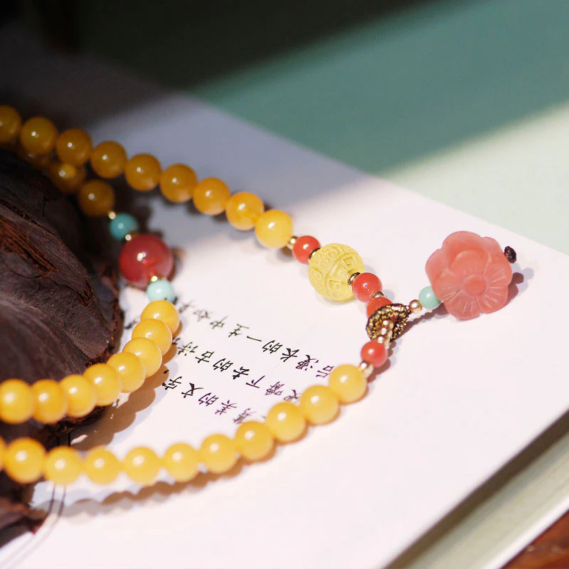Collana con ciondolo a forma di fiore in ambra curativa e bilanciata - Image 7