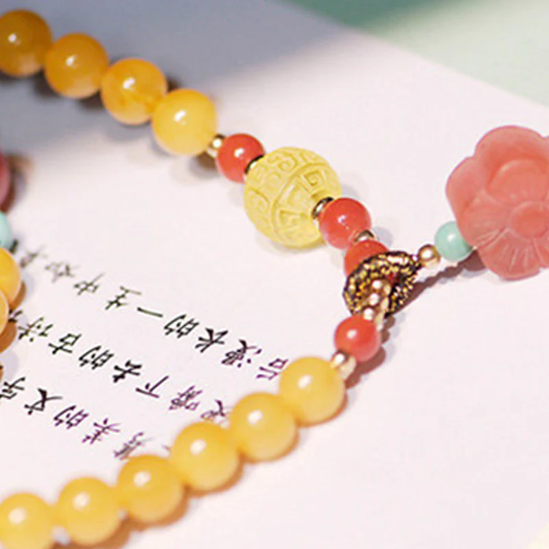 Collana con ciondolo a forma di fiore in ambra curativa e bilanciata - Image 8