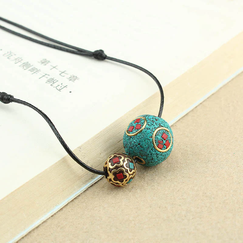 Collana con ciondolo con doppia perla turchese tibetana Buddha Stones, protezione e forza