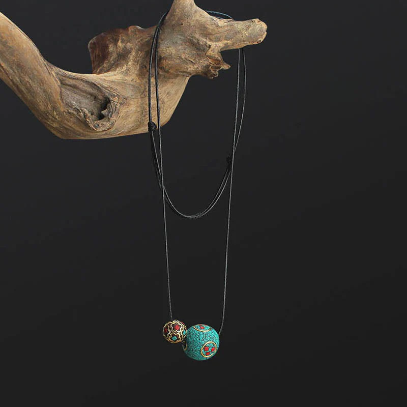 Collana con ciondolo con doppia perla turchese tibetana Buddha Stones, protezione e forza - Image 2