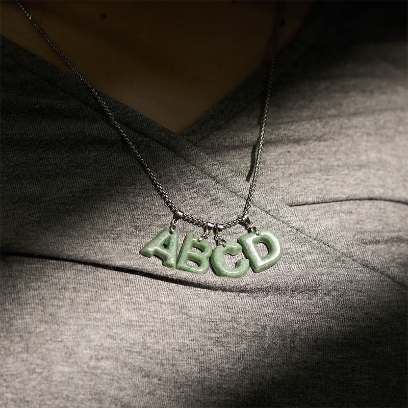 Collana con ciondolo della prosperità in acciaio al titanio con lettera AZ naturale Buddha Stones - Image 41