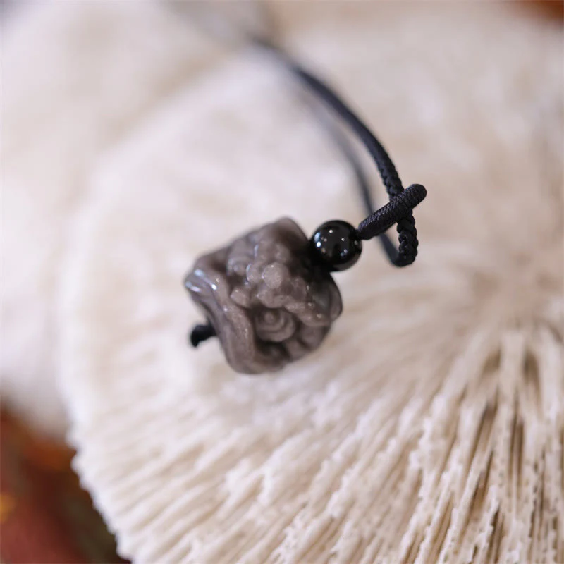 Collana con ciondolo di protezione del leone danzante in ossidiana lucida d'argento naturale Buddha Stones - Image 6