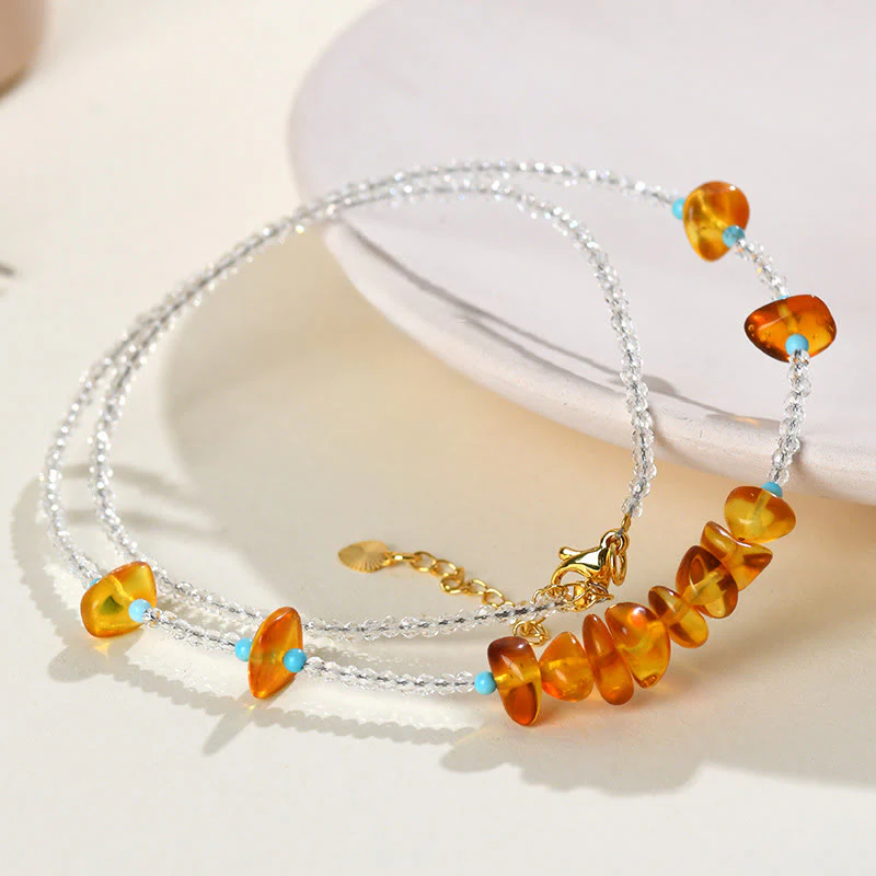 Collana con ciondolo in ambra di purezza irregolare con perline di cristallo bianco Buddha Stones - Image 9