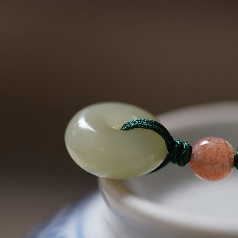 Collana con ciondolo in corda con fibbia della pace in giada rotonda naturale Buddha Stones Lotus Abundance - Image 3