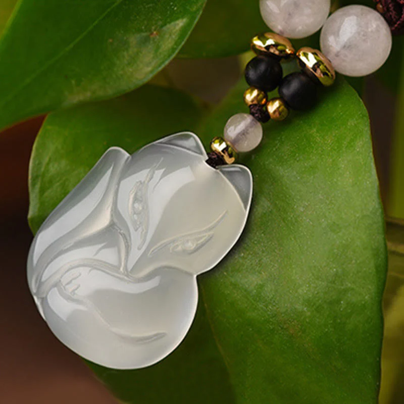 Collana con ciondolo in corda dell'armonia con perline di cristallo rosa di volpe e calcedonio Buddha Stones - Image 7