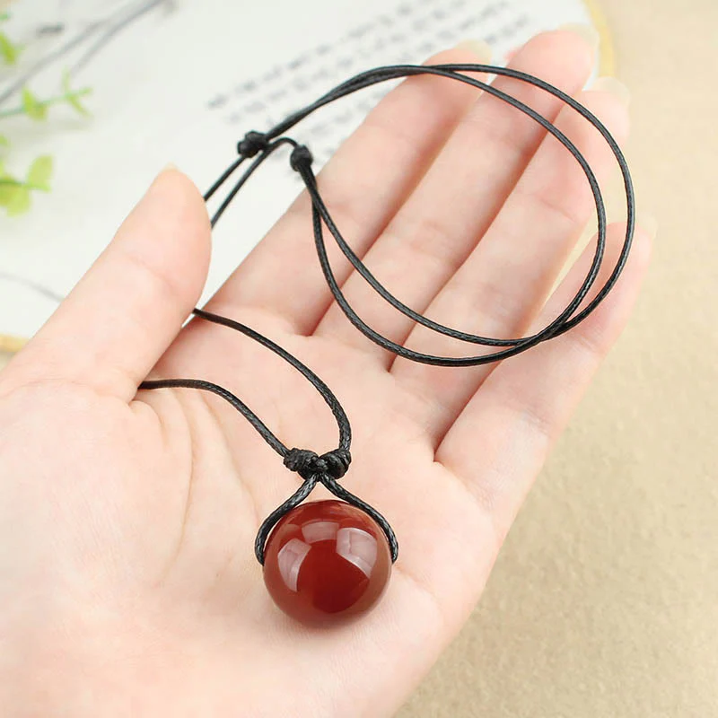 Collana con ciondolo in corda di pelle con perline di agata rossa e Buddha Stones - Image 10