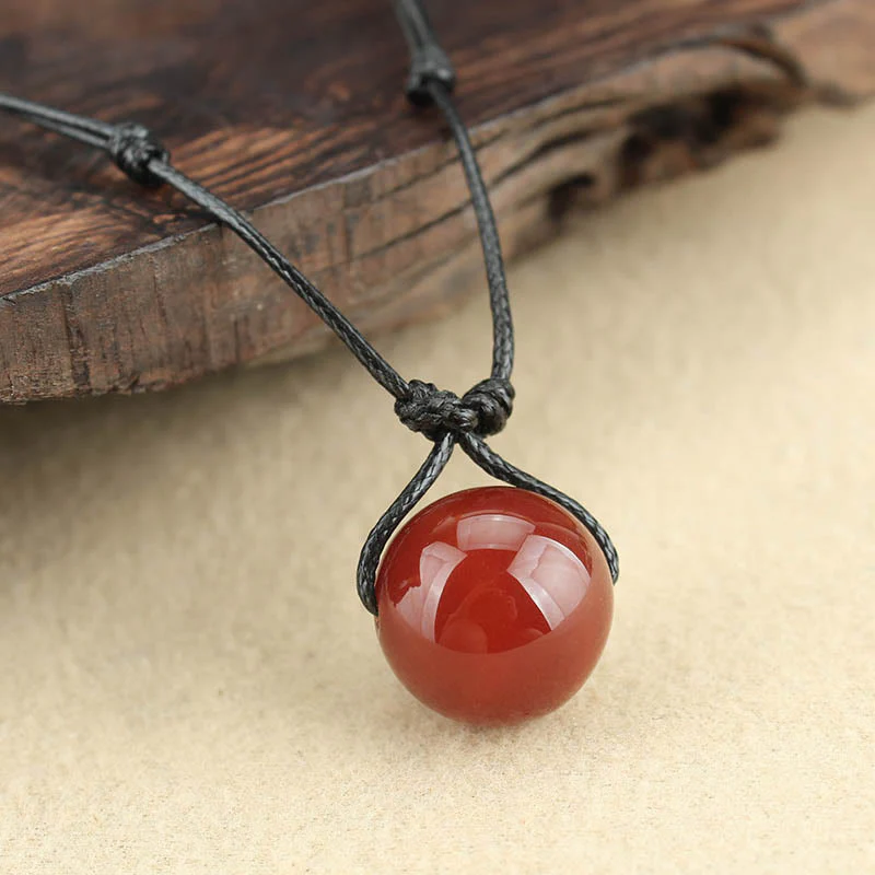 Collana con ciondolo in corda di pelle con perline di agata rossa e Buddha Stones - Image 3