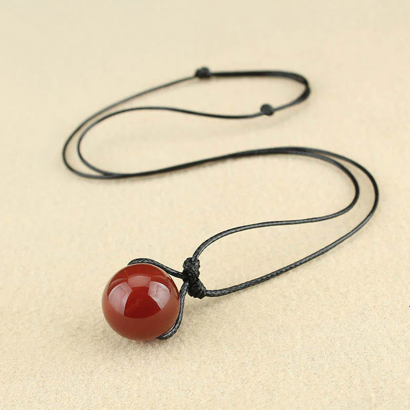 Collana con ciondolo in corda di pelle con perline di agata rossa e Buddha Stones - Image 5