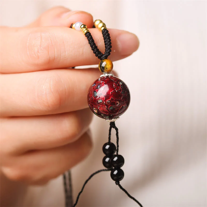 Collana con ciondolo in pietra Buddha Stones, legno di ebano, perlina di Venere, Aurora, lacca artigianale, pace