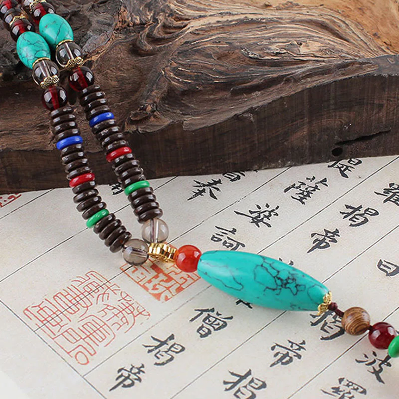 Collana con ciondolo in pietra turchese, pietra di legno di wenge, protezione e calma Buddha Stones - Image 3