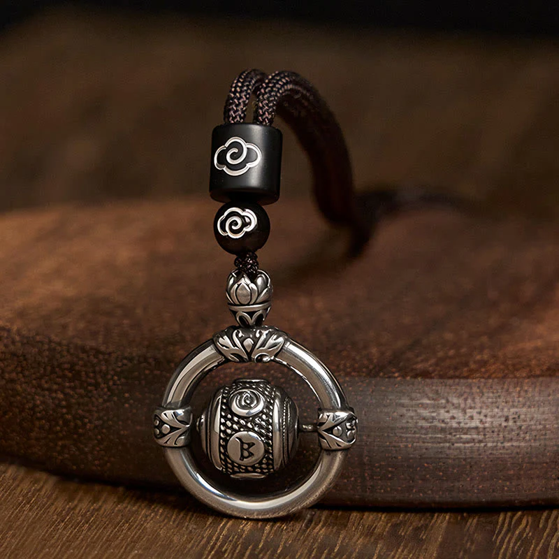 Collana con ciondolo rotante in argento placcato in rame Buddha Stones Om Mani Padme Hum