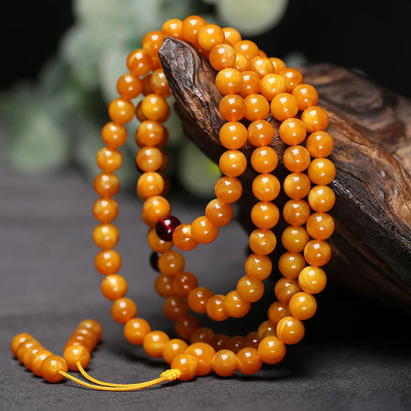 Mala con perline rotonde in ambra tibetana Buddha Stones