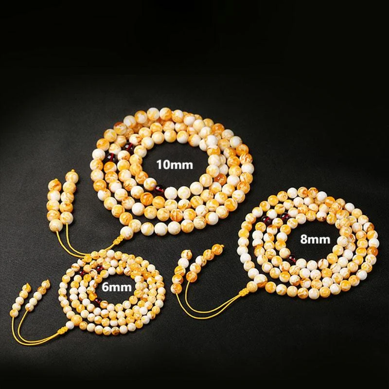 Mala tibetano in ambra bianca e gialla con 108 perle Buddha Stones - Image 10