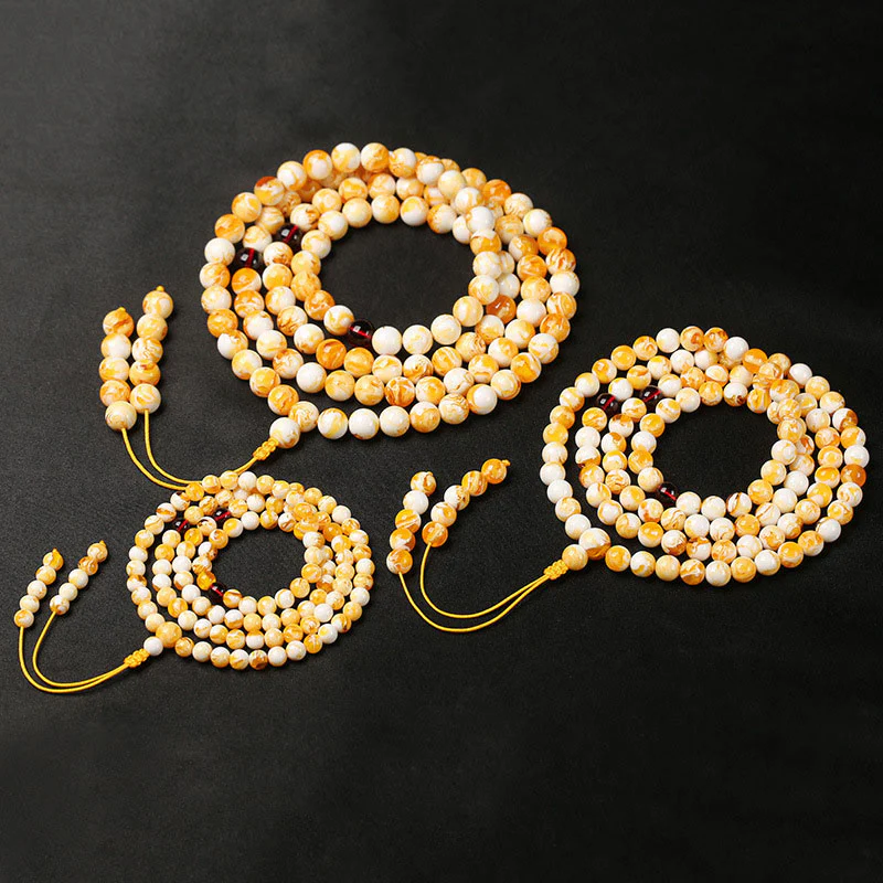 Mala tibetano in ambra bianca e gialla con 108 perle Buddha Stones - Image 9