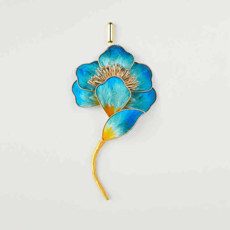 Spilla con fiore blu in seta di gelso e Buddha Stones, realizzata a mano